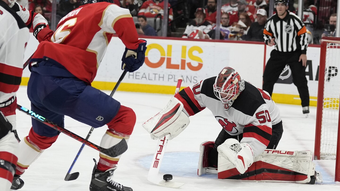 Daws stops 36 shots Devils top Panthers 4 1 to end Florida s 9